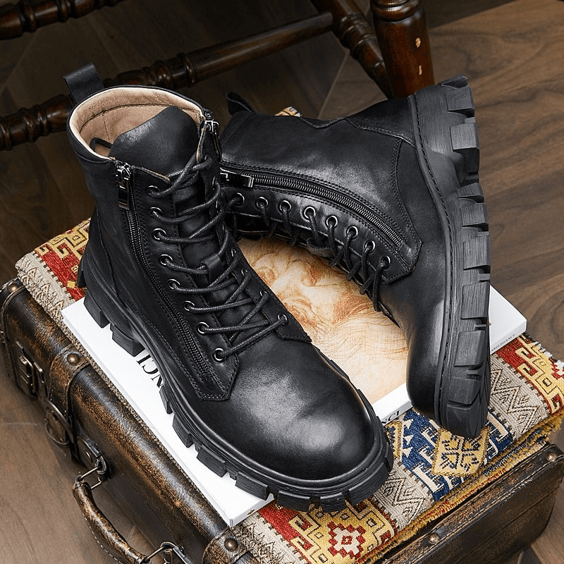 Men's black leather mid-calf boots with a retro design, featuring zippers and sturdy soles, perfect for casual wear.
